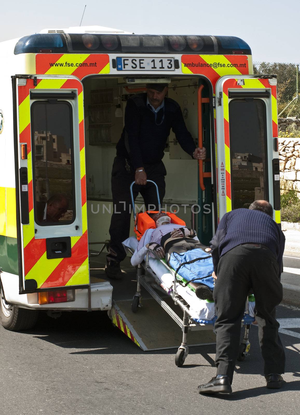 MOSTA, MALTA - APR16 - An injured cyclist being loaded into an ambulance on April 16, 2009