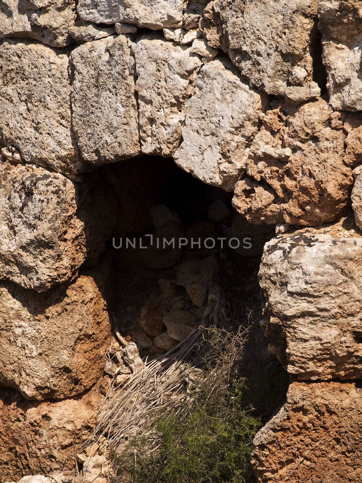 An old and neglected historic Roman wall on the island of Malta