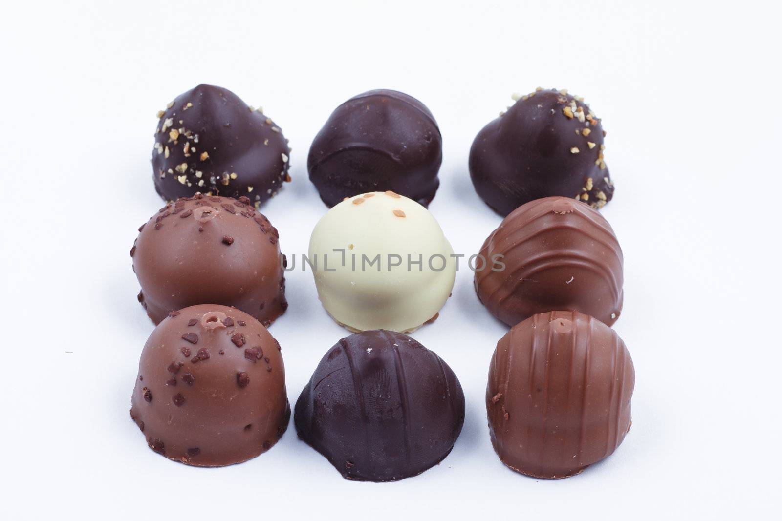 A collection of mixed chocolates and truffles