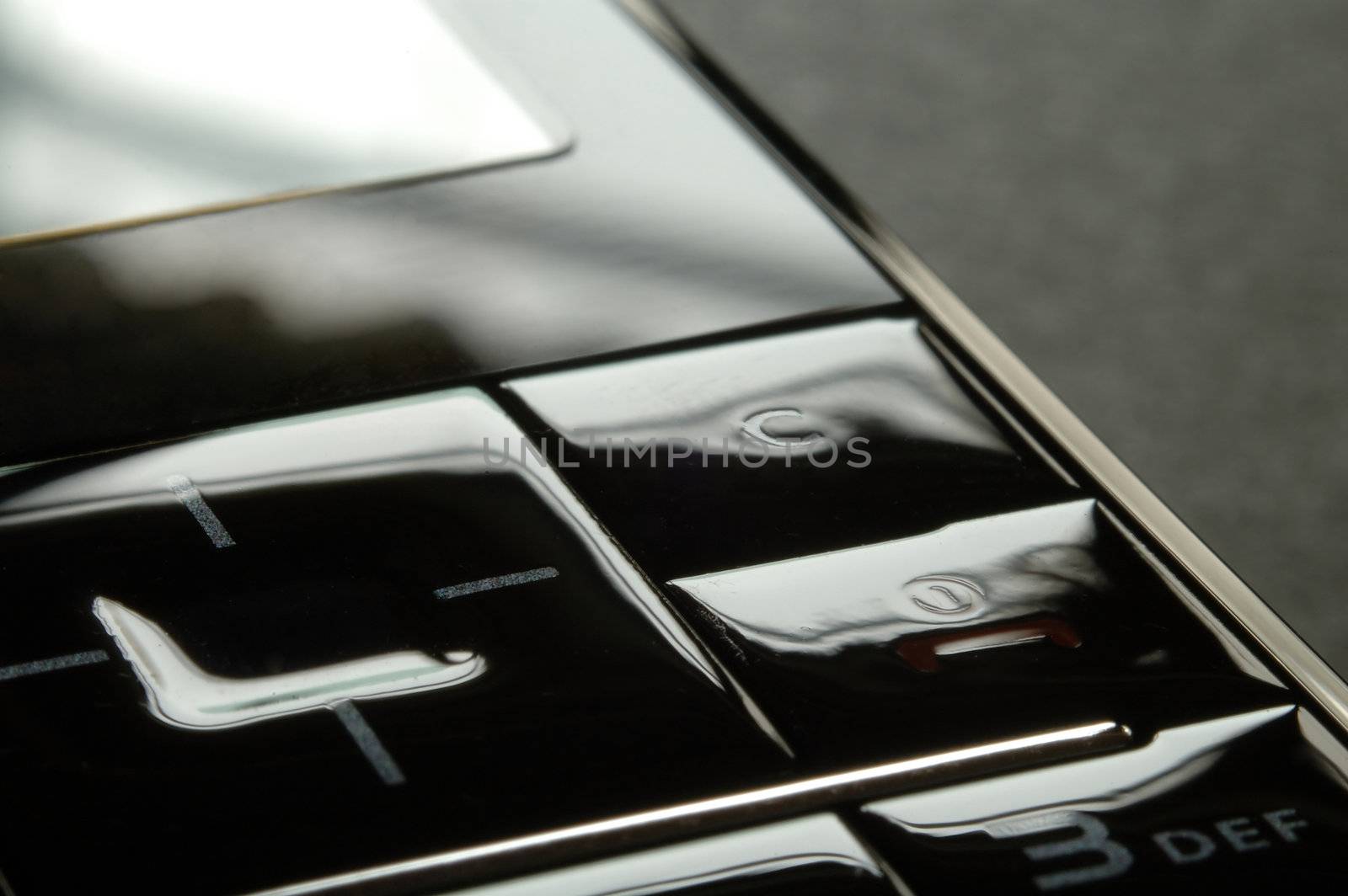 Close up shot of mobile keypad under dark environment