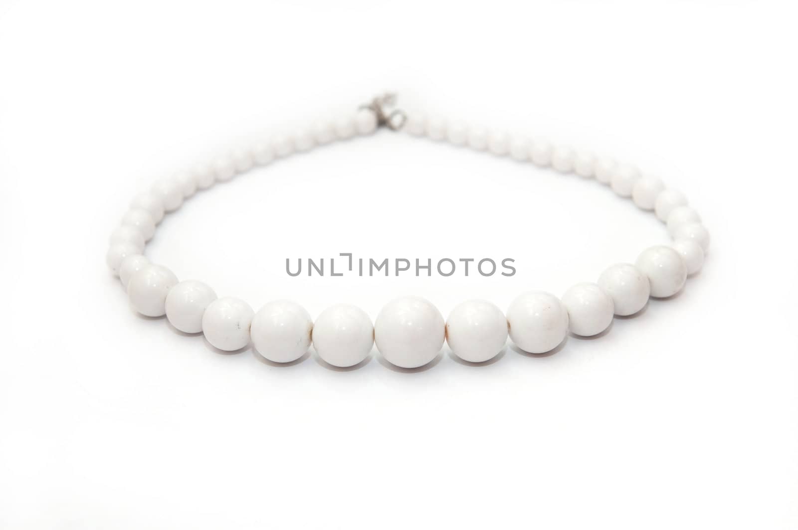 white bead isolated on white