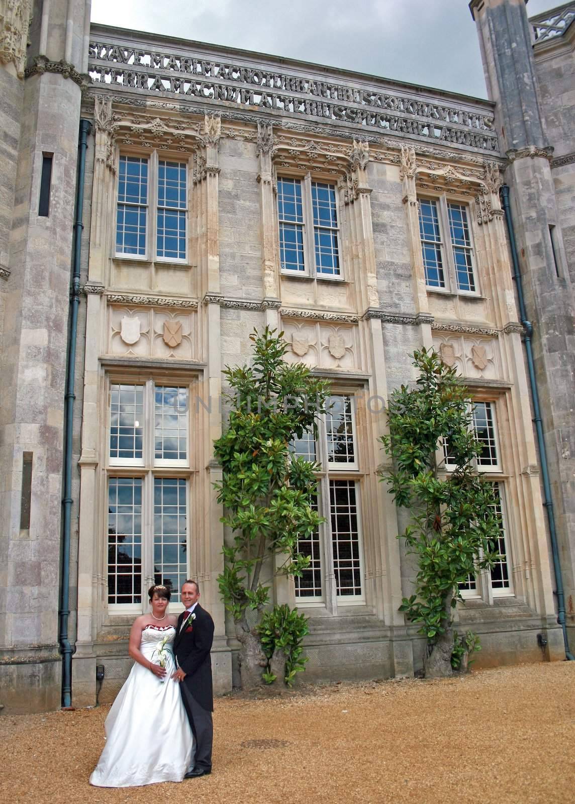 The Bride and Groom outside an Historic Building.