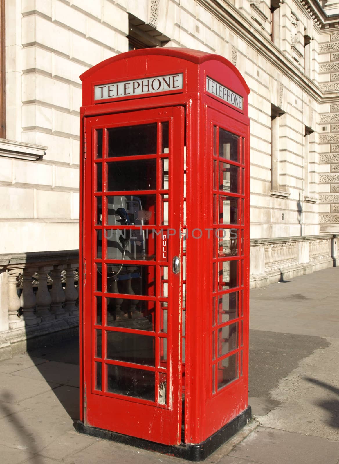 Traditional Red Telephone Box in London, UK