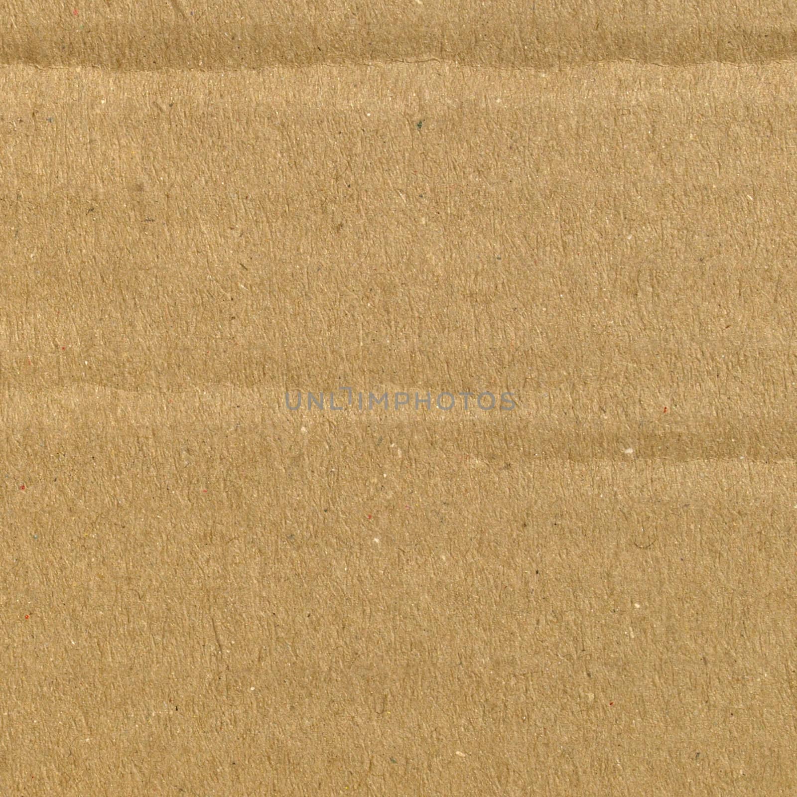 Brown grunge corrugated cardboard sheet useful as a background