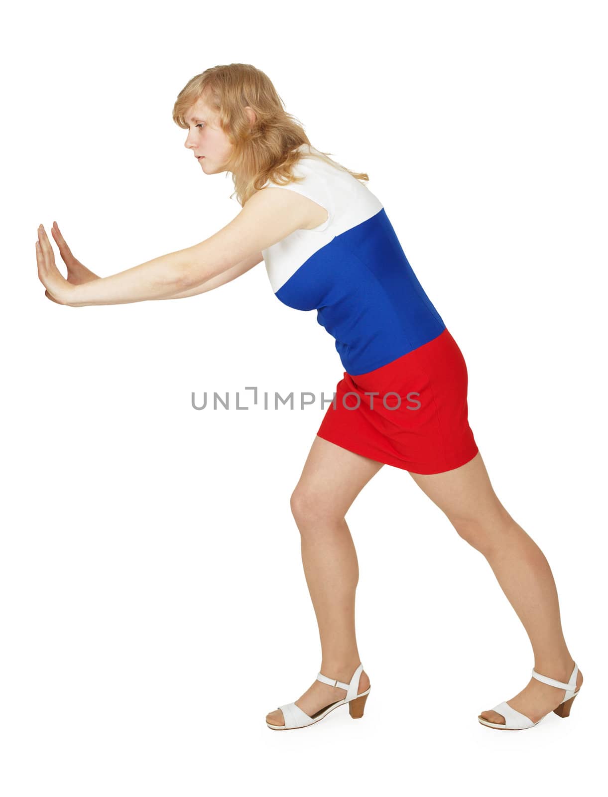 Young woman pushing something hands isolated on white background