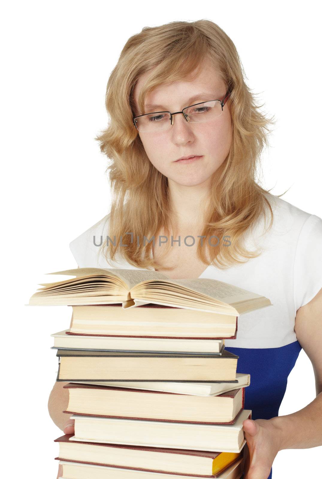 Female student with a pile of books isolated on white background