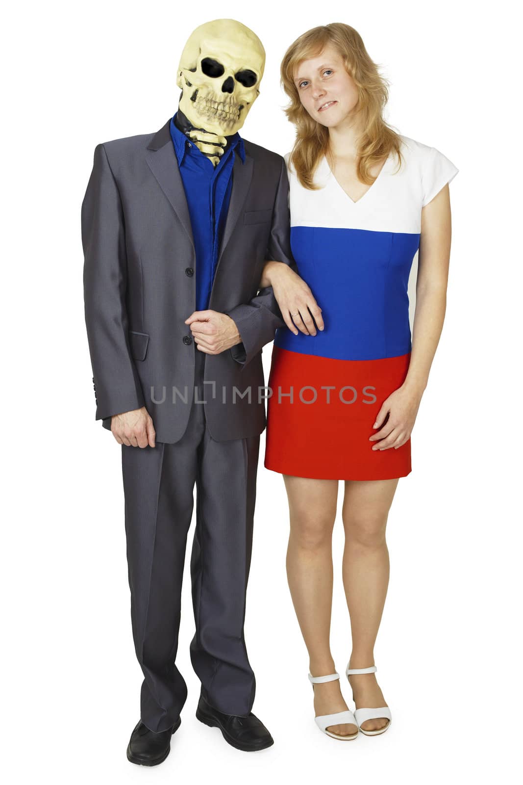 A young woman and a skeleton in a suit isolated on white background