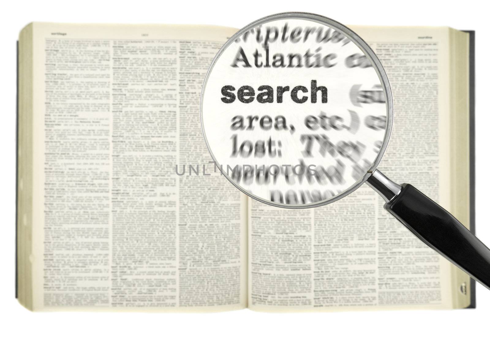 A magnifying glass on the word SEARCH on a dictionary.