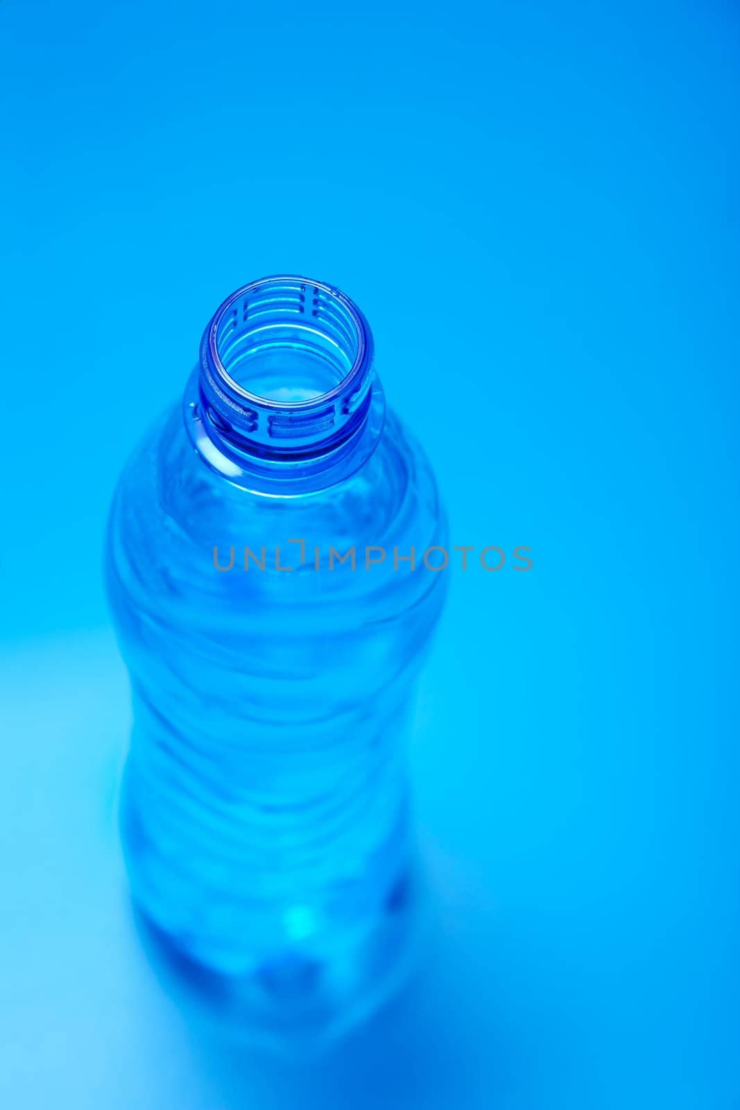 Open bottle of mineral water