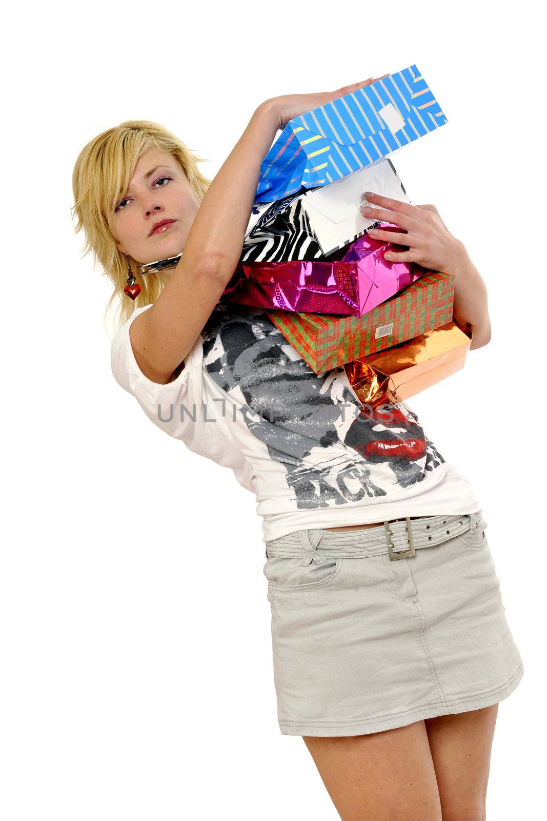 Half body view of young attractive woman doing shopping with lots of shopping bags. Isolated on white background.