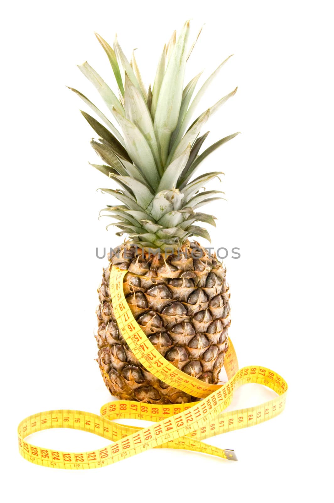 fresh pineapple with tape measure isolated on white background by ladyminnie