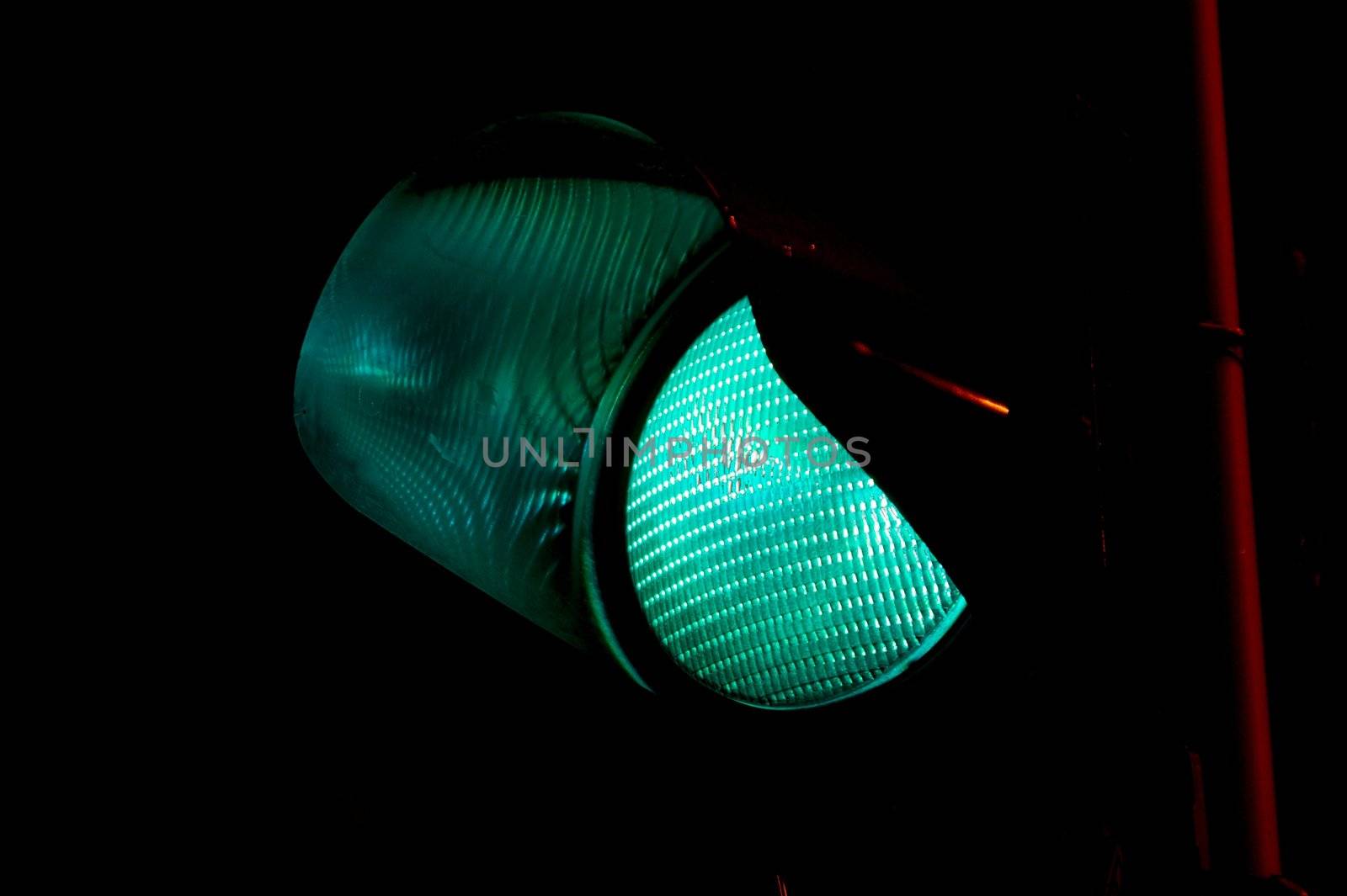 closeup of the green light on a traffic light