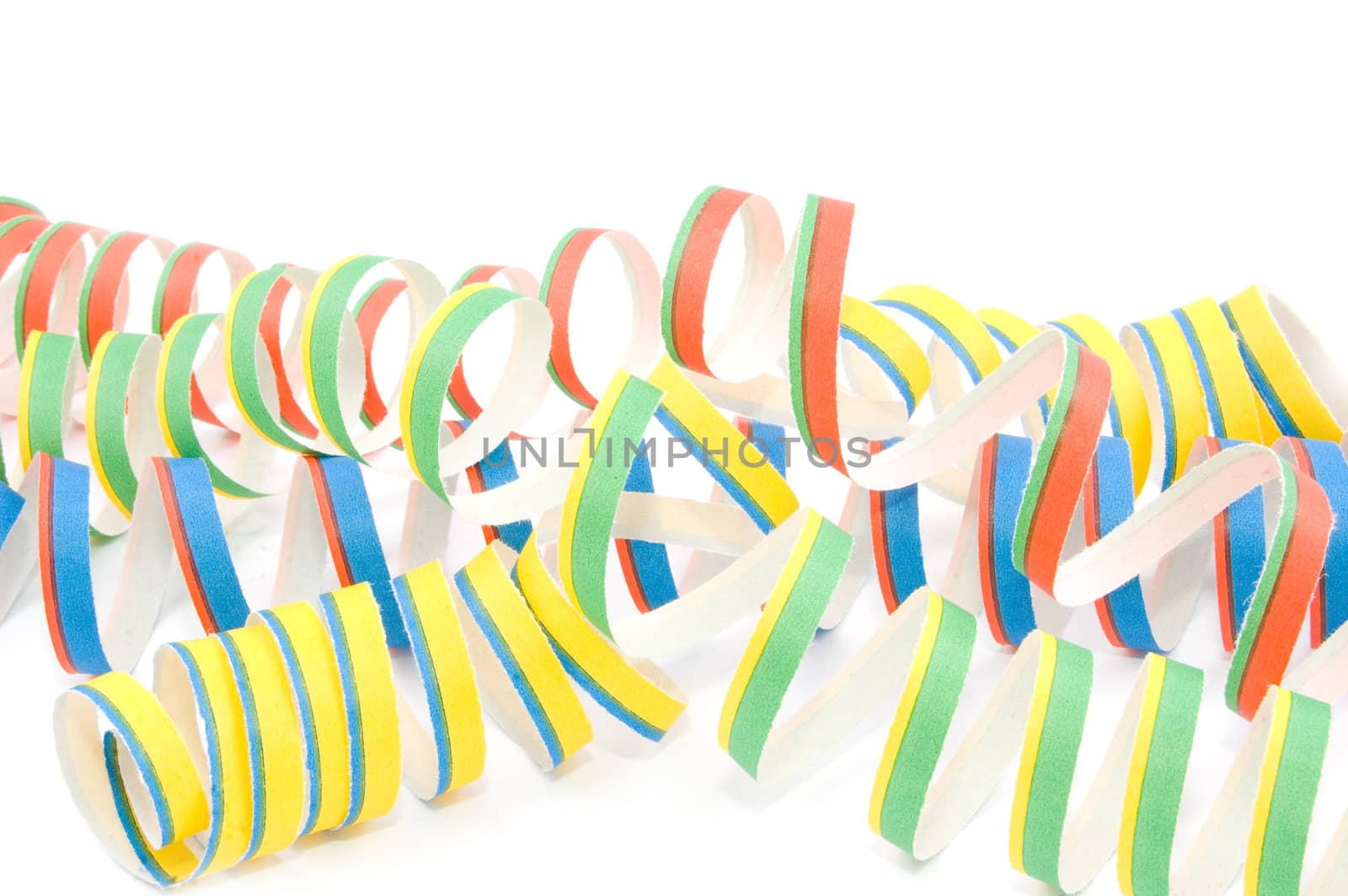 Colorful party streamers on white background
