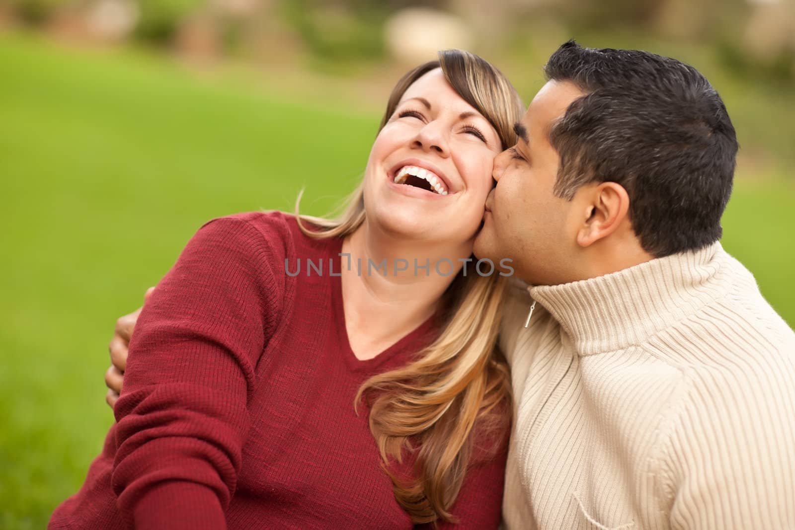 Attractive Mixed Race Couple Portrait in the Park.