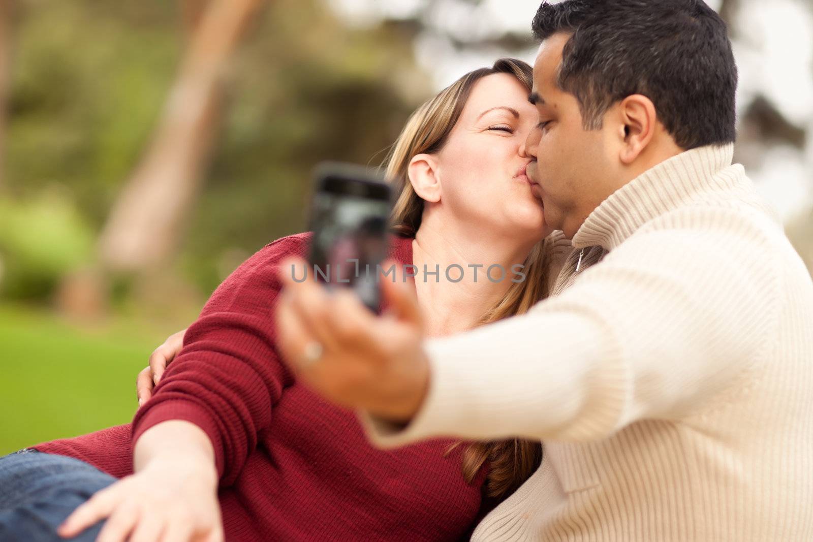 Attractive Mixed Race Couple Taking Self Portraits by Feverpitched