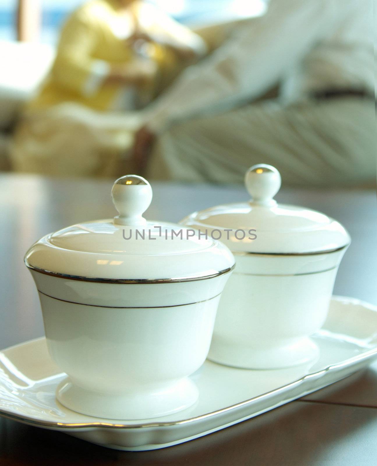 Two tea cups on a tray