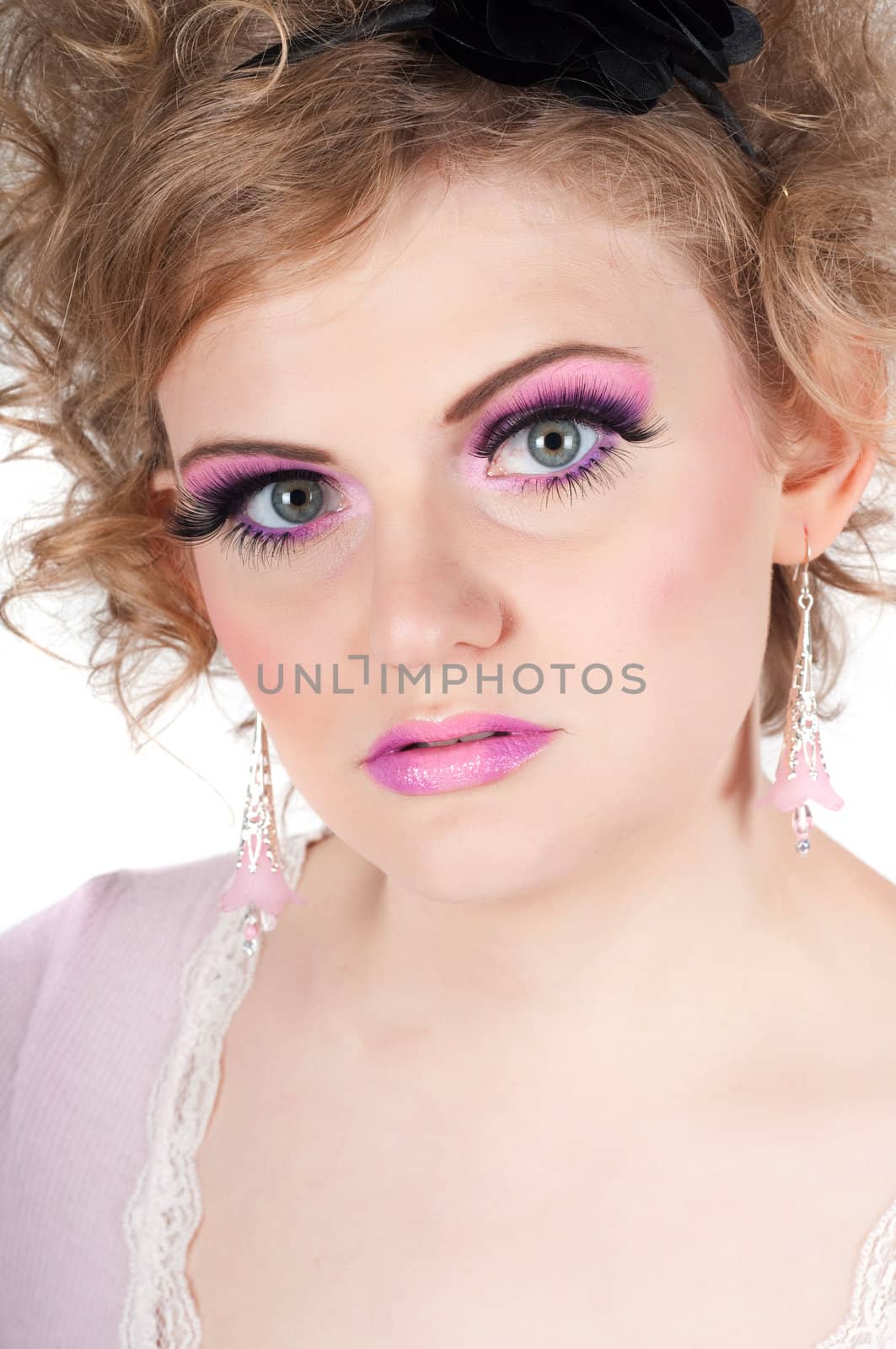 Portrait of young beautiful sexy tender blonde with fancy make-up