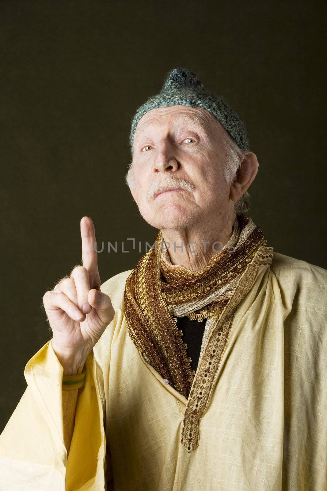 Portrait of wise guru with knit cap