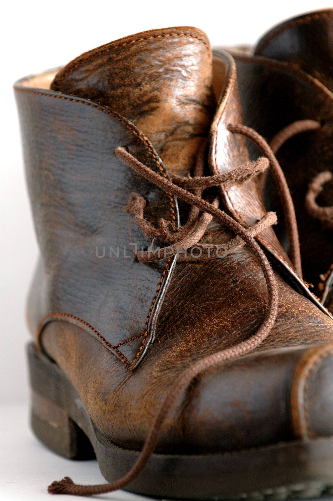 Close up of leather boots with white background