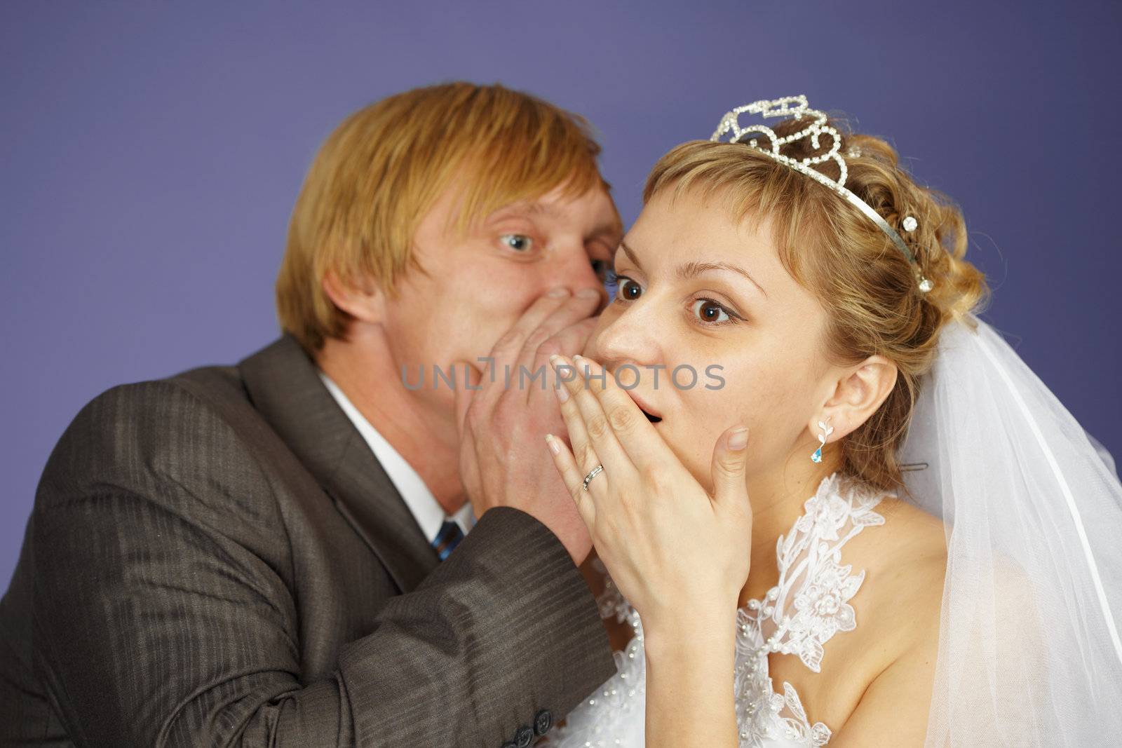 The groom tells the bride amazing news