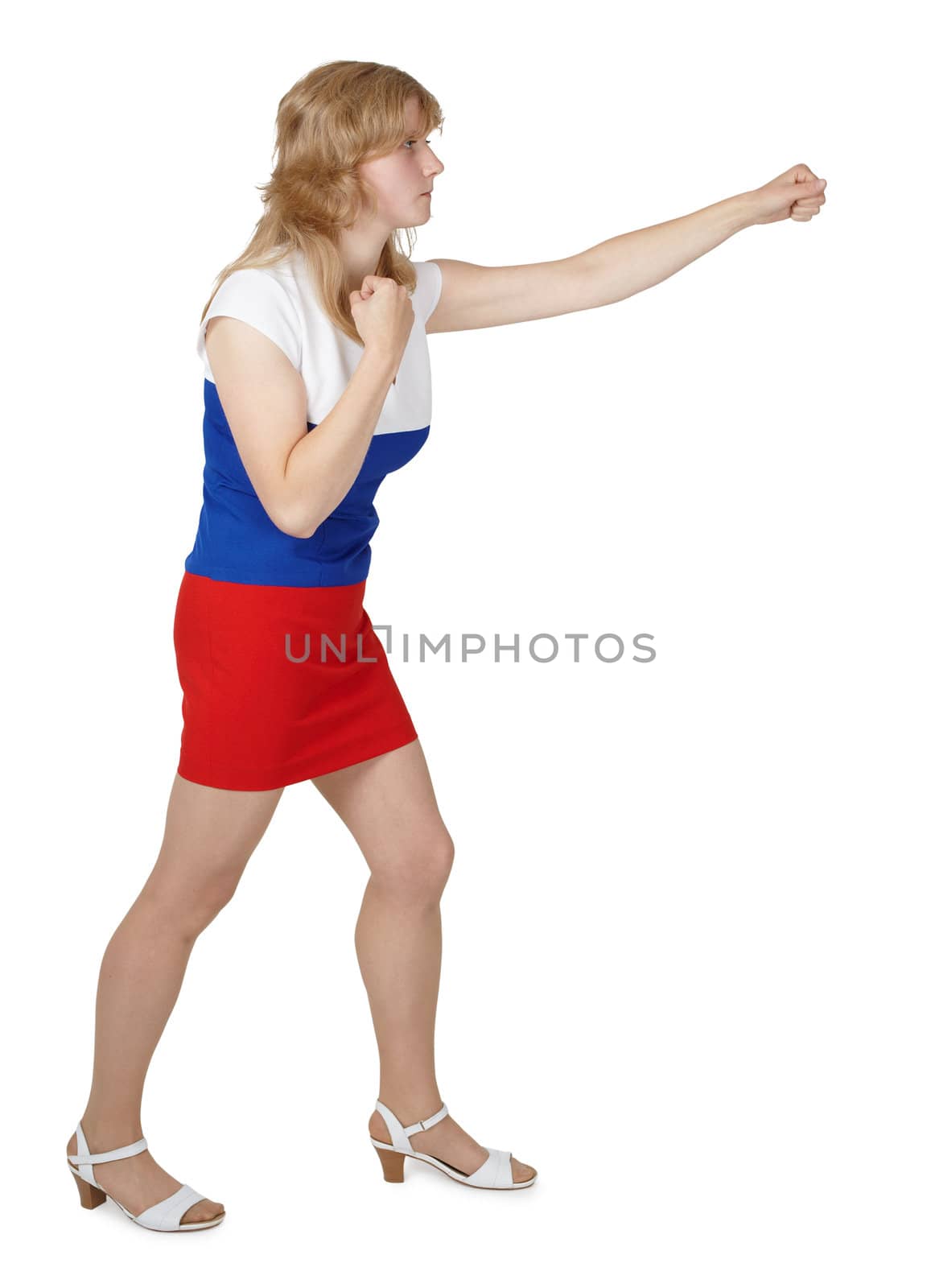 A young woman in three-color dress beats hand