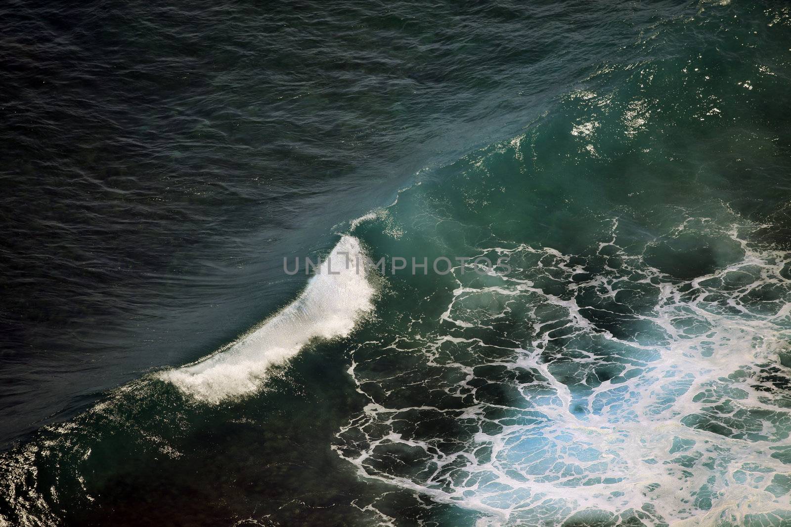 Big wave crashes on to the shore. Indian ocean