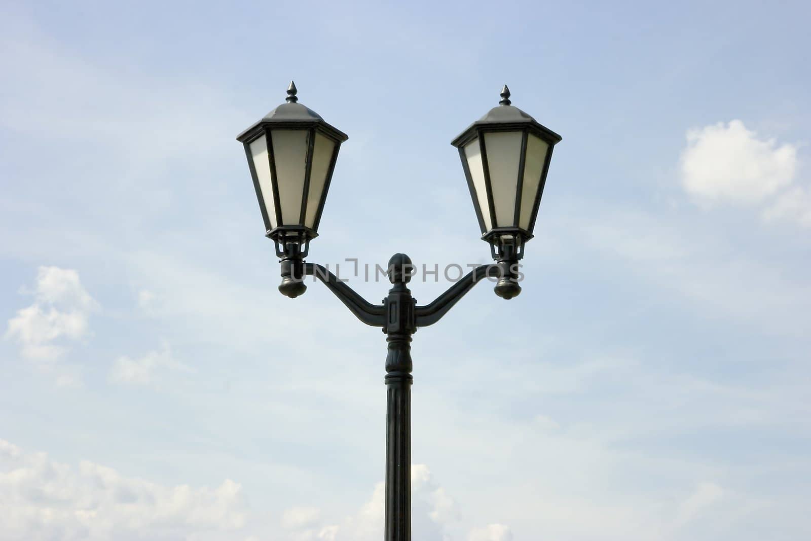 Photo of a lamppost against the summer sky