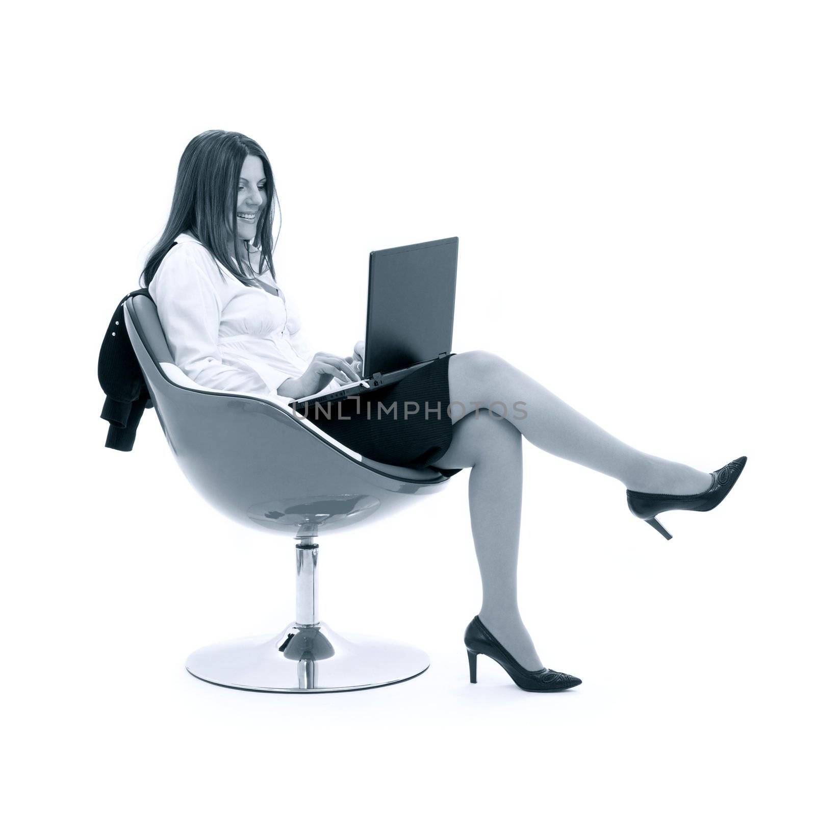 monochrome businesswoman with laptop in chair over white