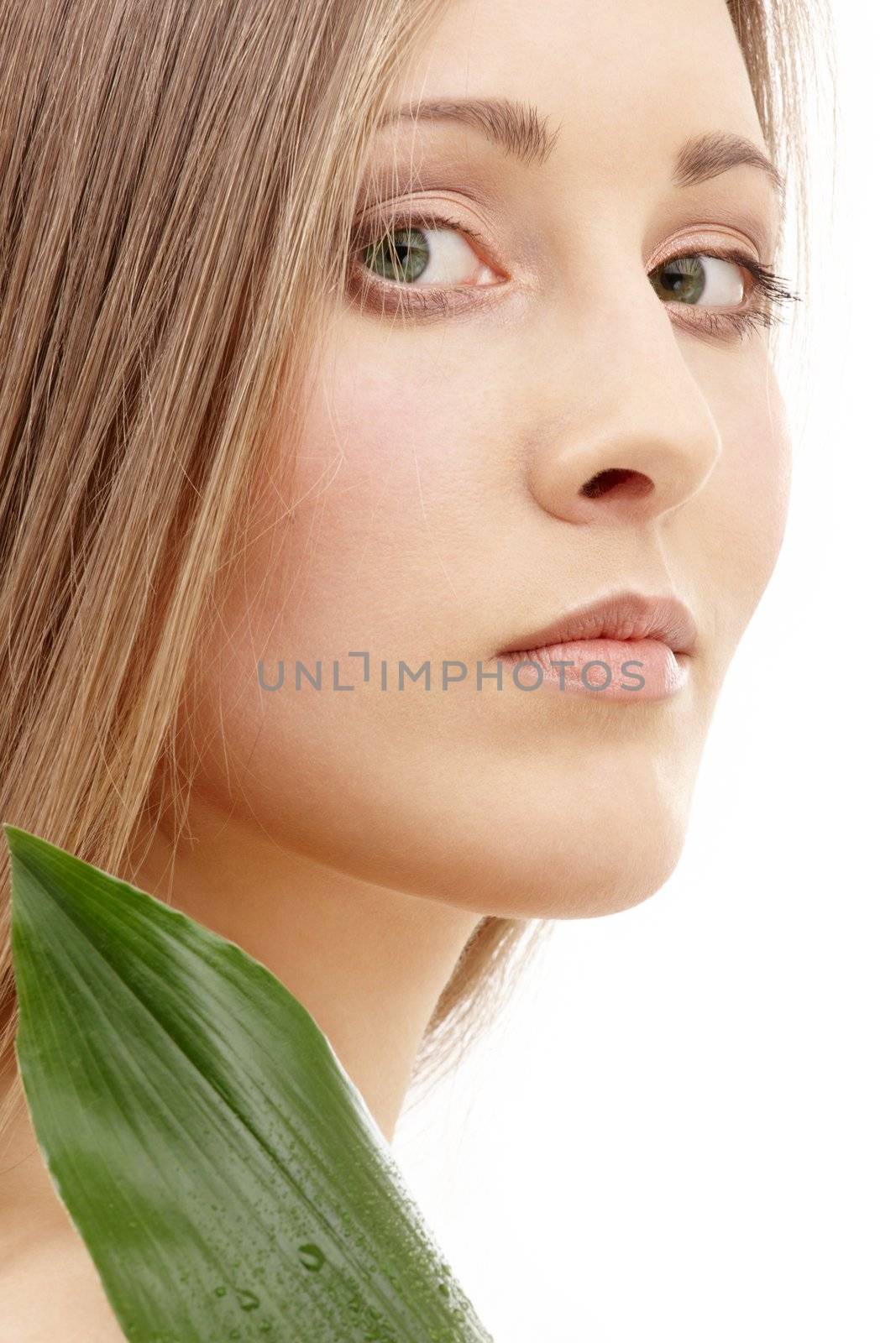 bright picture of lovely woman with green leaf