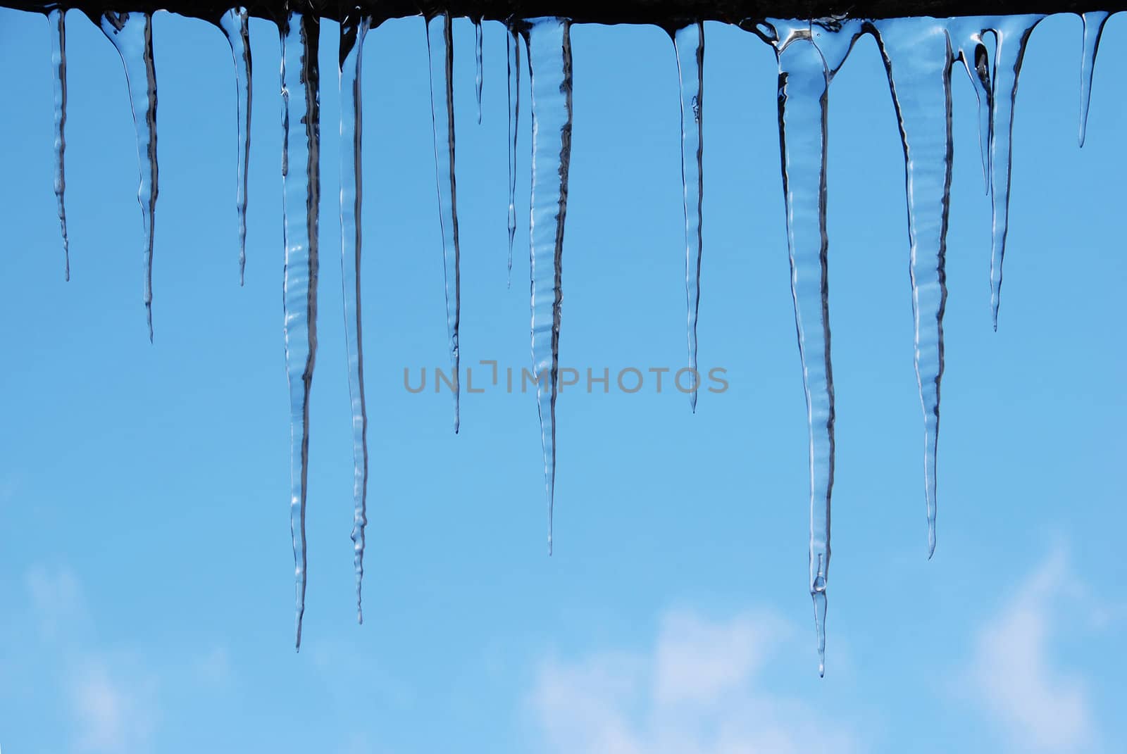 icicles on a blue sky background