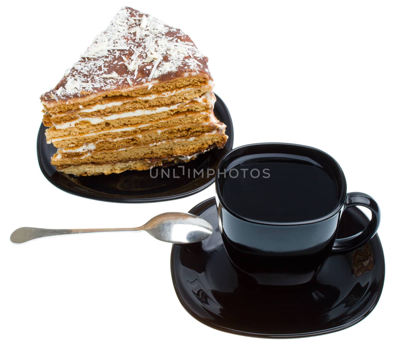 piece of honey cake and tea cup, isolated on white