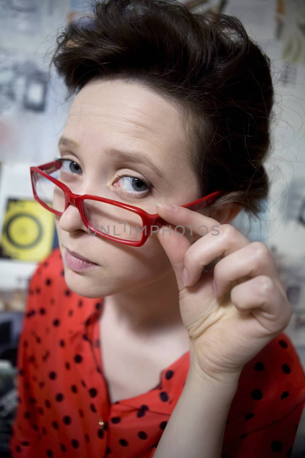 comic portrait of funny girl wearing vintage dress and comic glasses