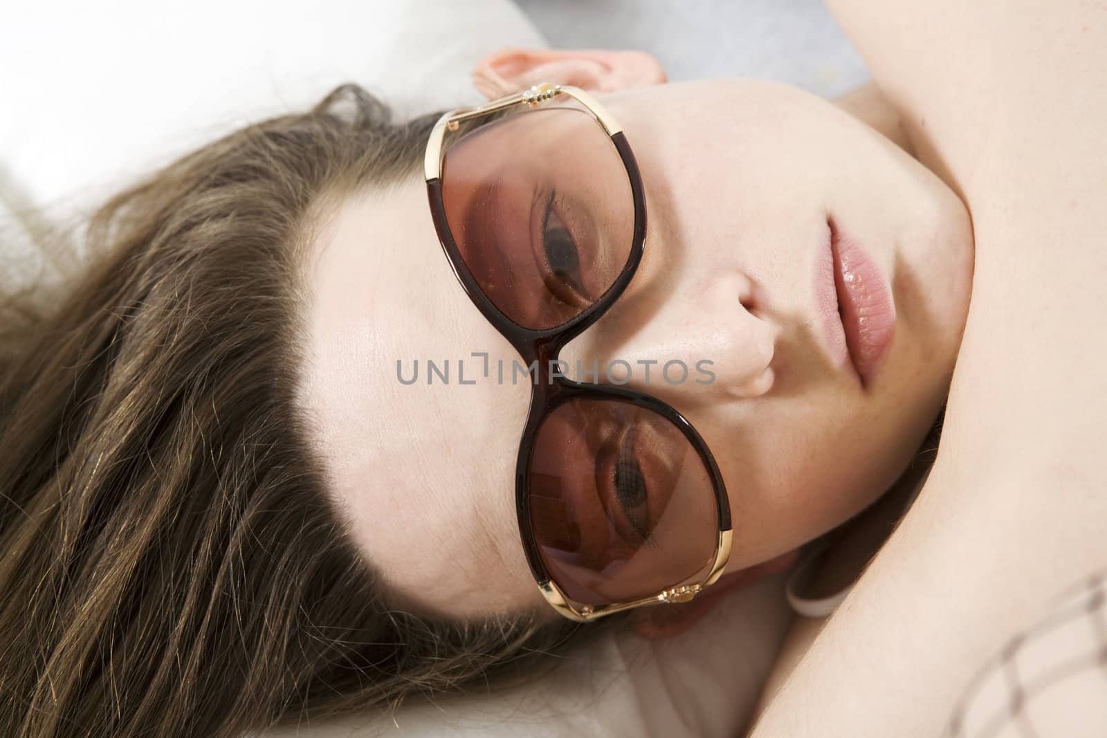 close up portrait girl wearing fashionable glasses by elenarostunova