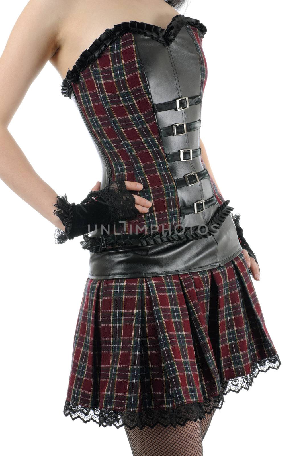 Part of young female body weared in corset and skirt. Gloves on hands and stocking on legs. Isolated on white background