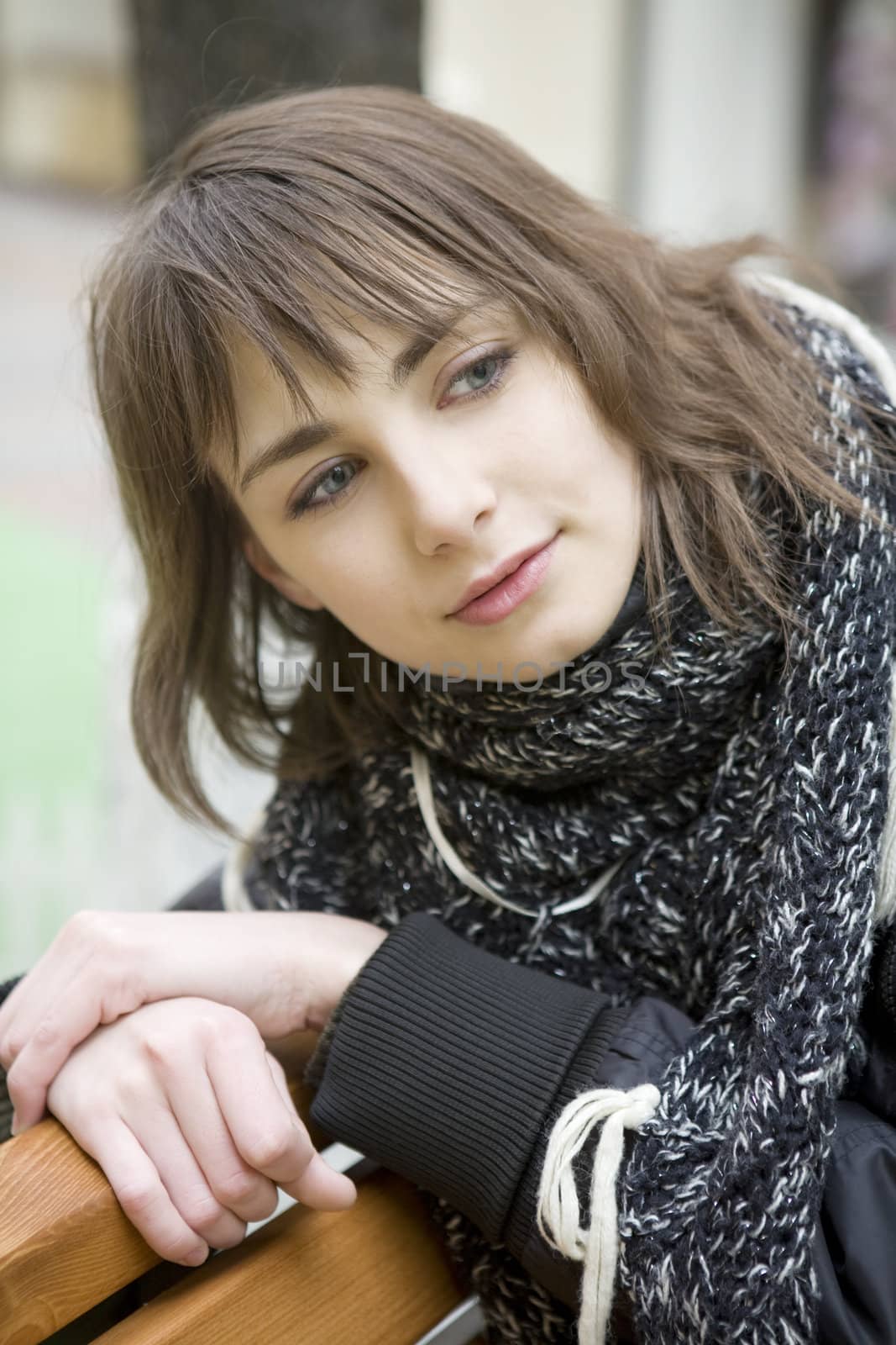 young attractive woman sitting on bench in state department store. Moscow