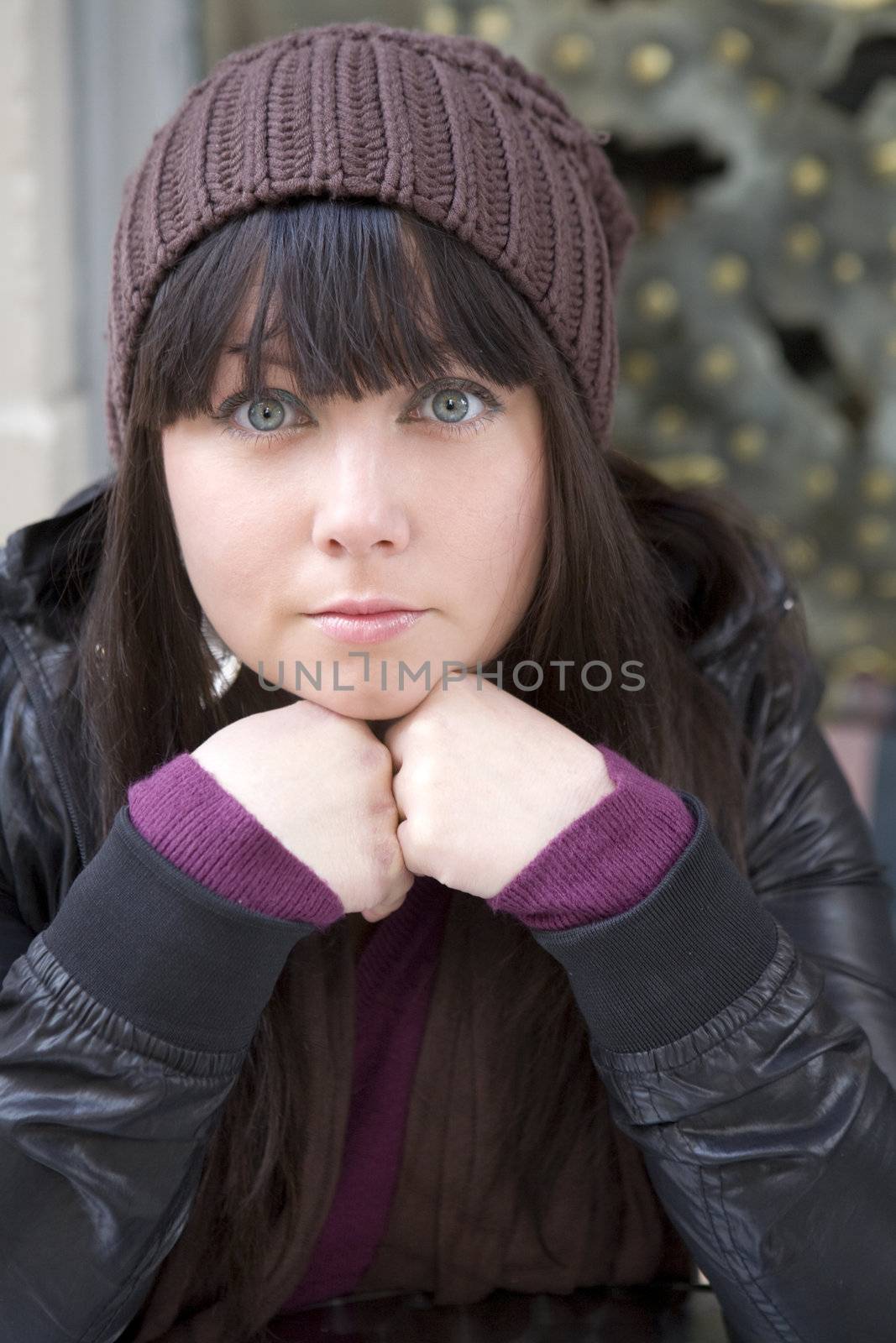 portrait young attractive pensive woman wearing cap