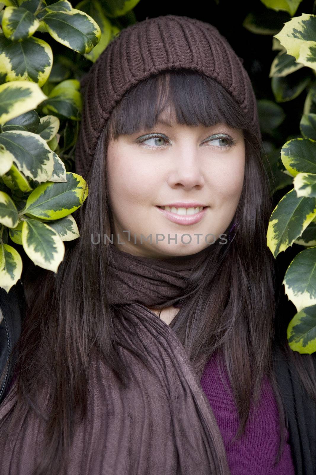 young attractive pensive woman wearing cap  by elenarostunova