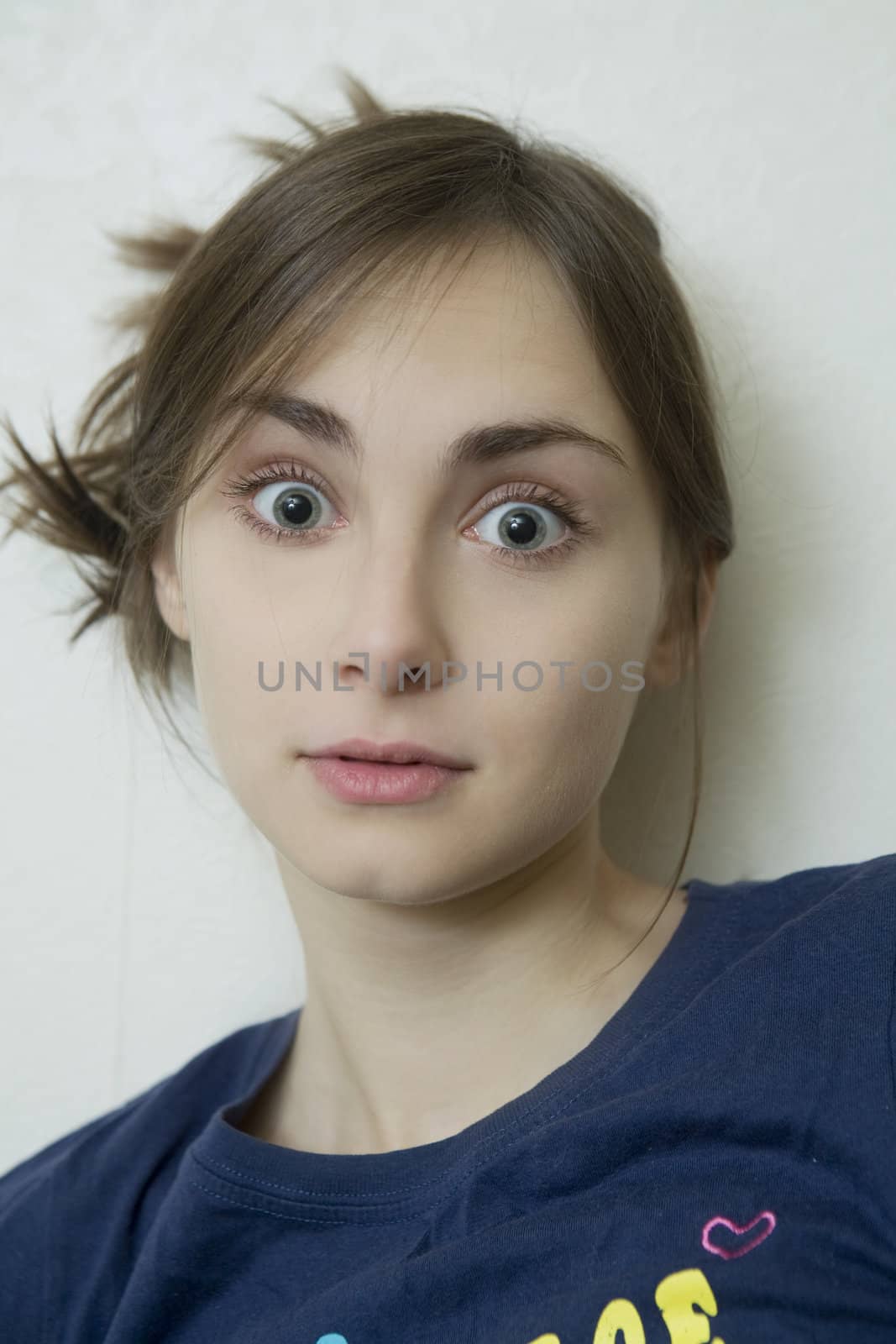 portrait of young surprised girl by elenarostunova