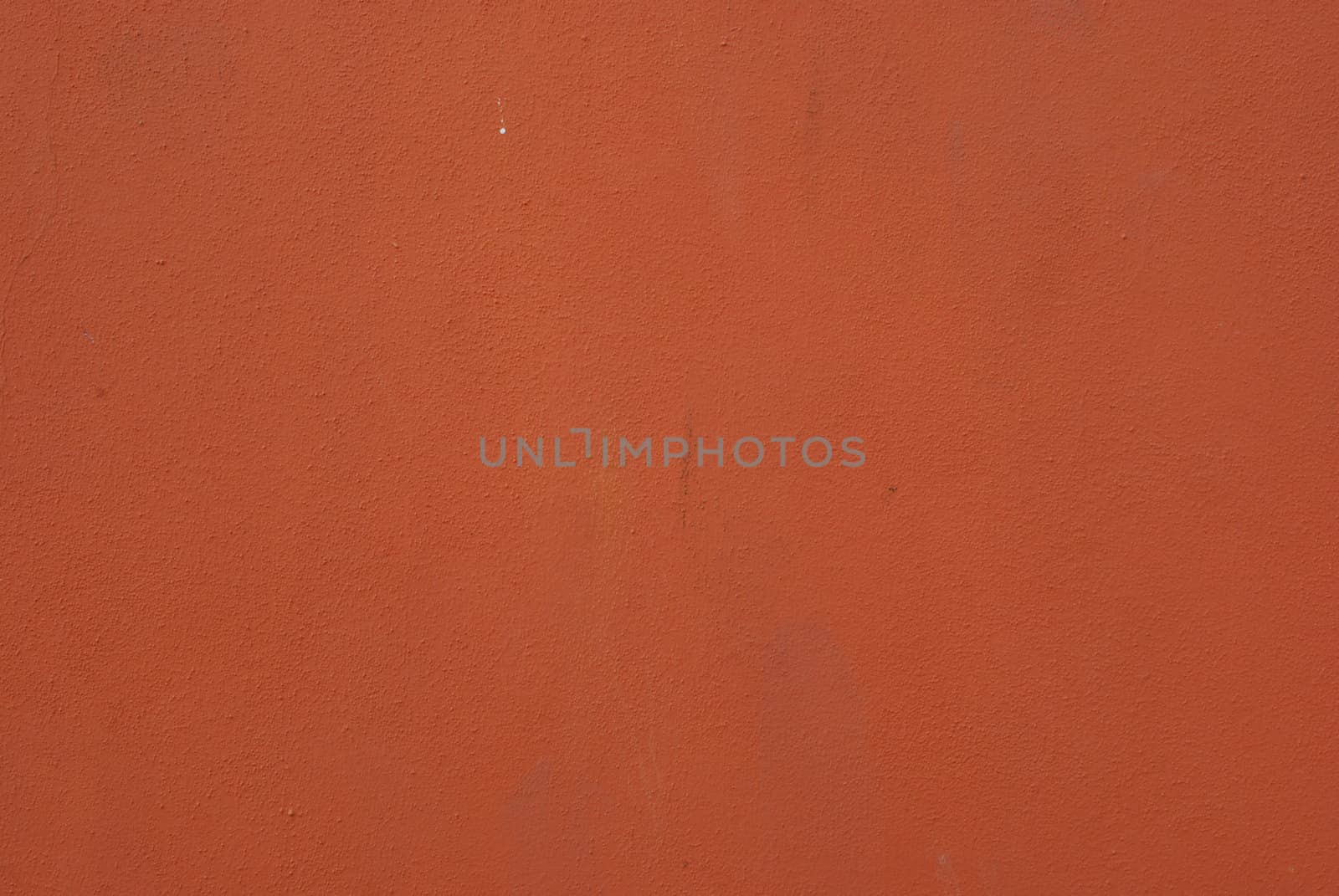 painted wall in orange (urban art)