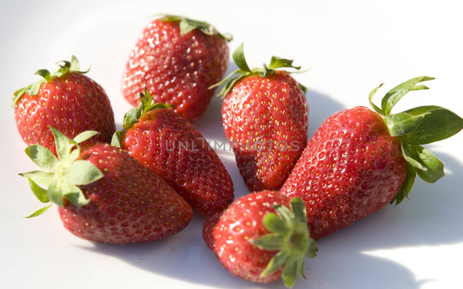 Strawberries on the white plate