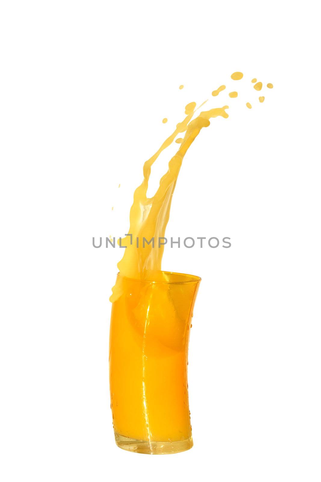 Nice yellow glass of splashing orange juice isolated on white background 