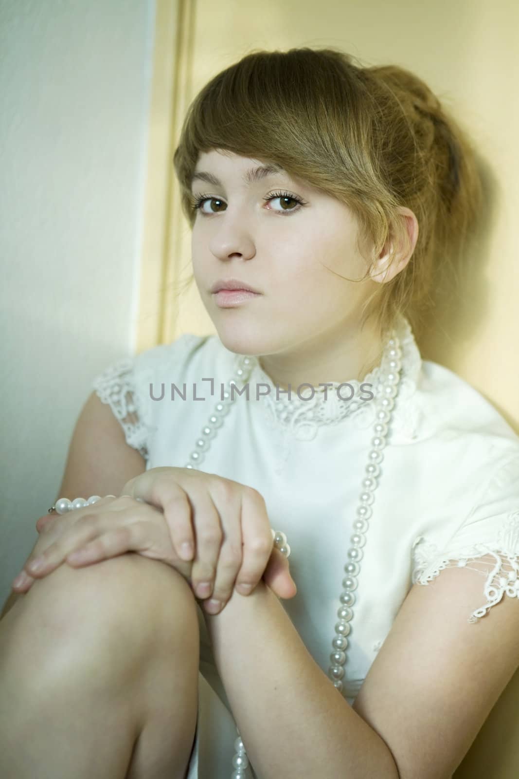 portrait of young attractive girl with glassbeads