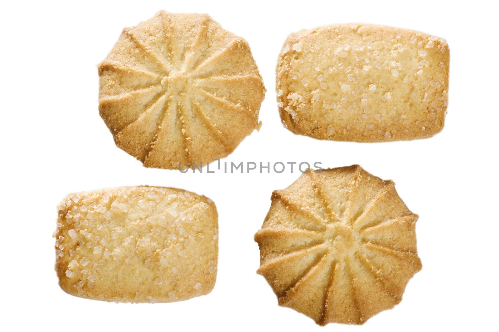 Four cookies with sugar. White background.