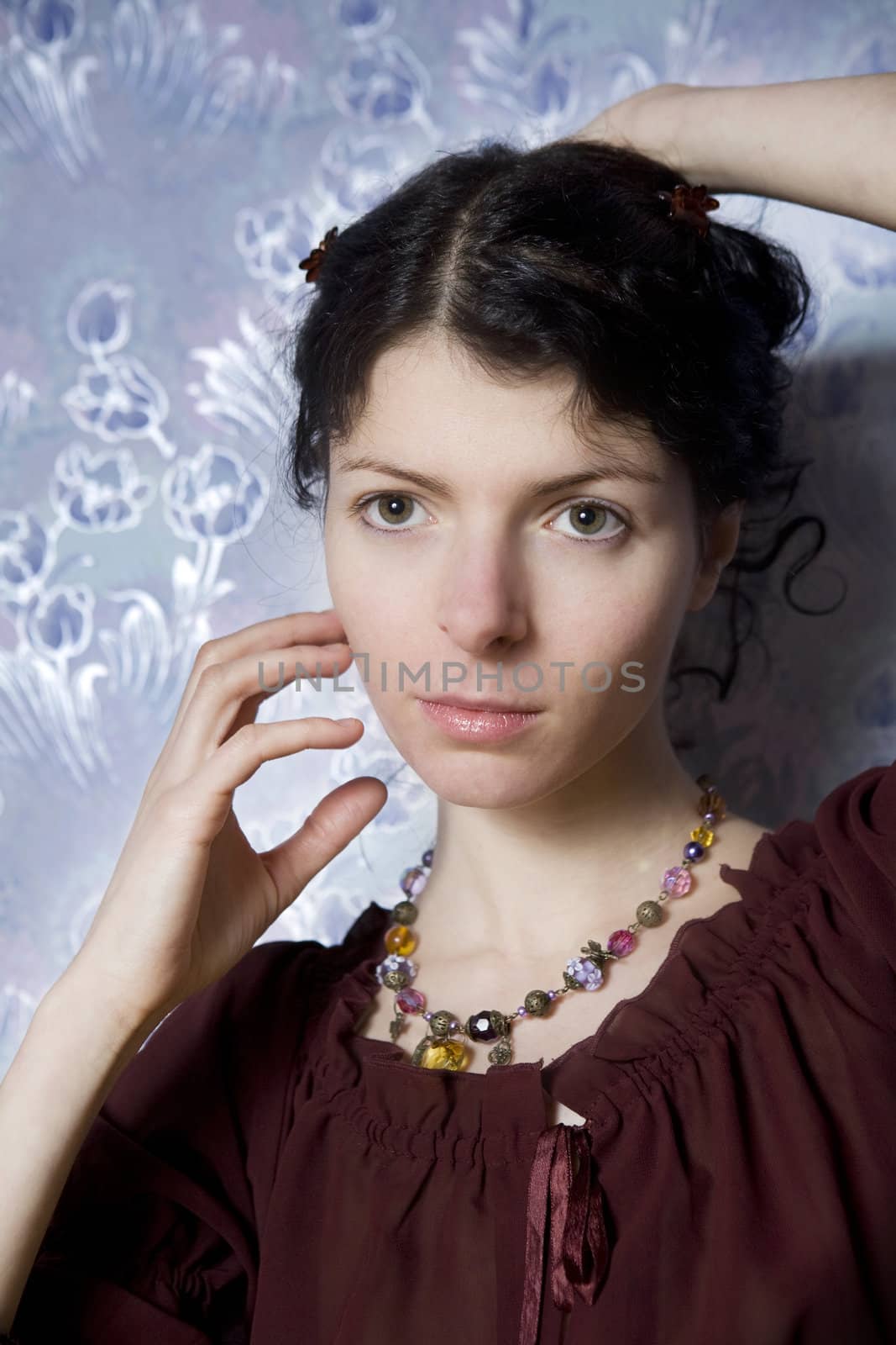 closeup portrait serious attractive woman with glass beads
