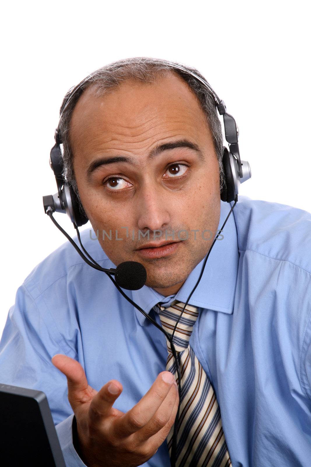 man in a business call center by jpcasais