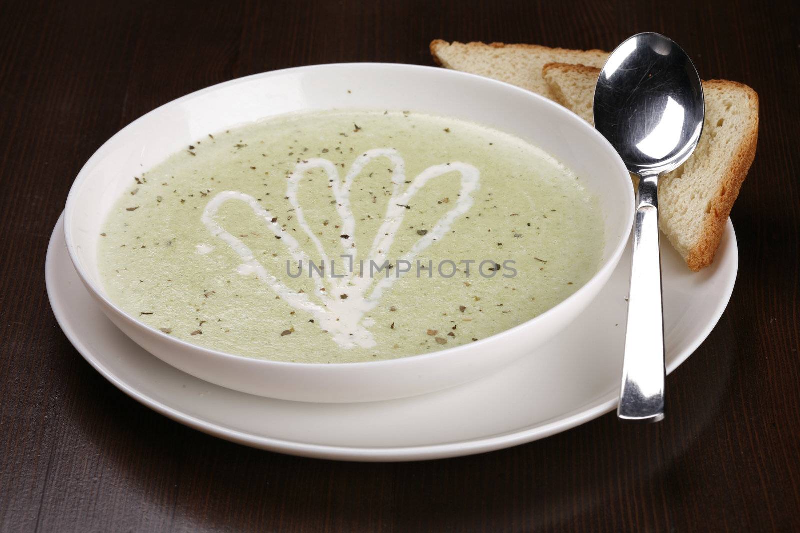 bowl of brocolli soup by lipik