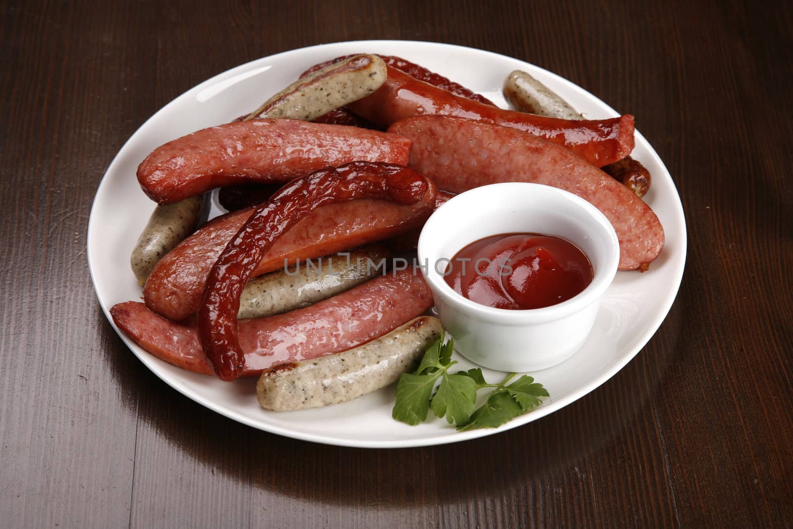 set of sausages on table with clipping path