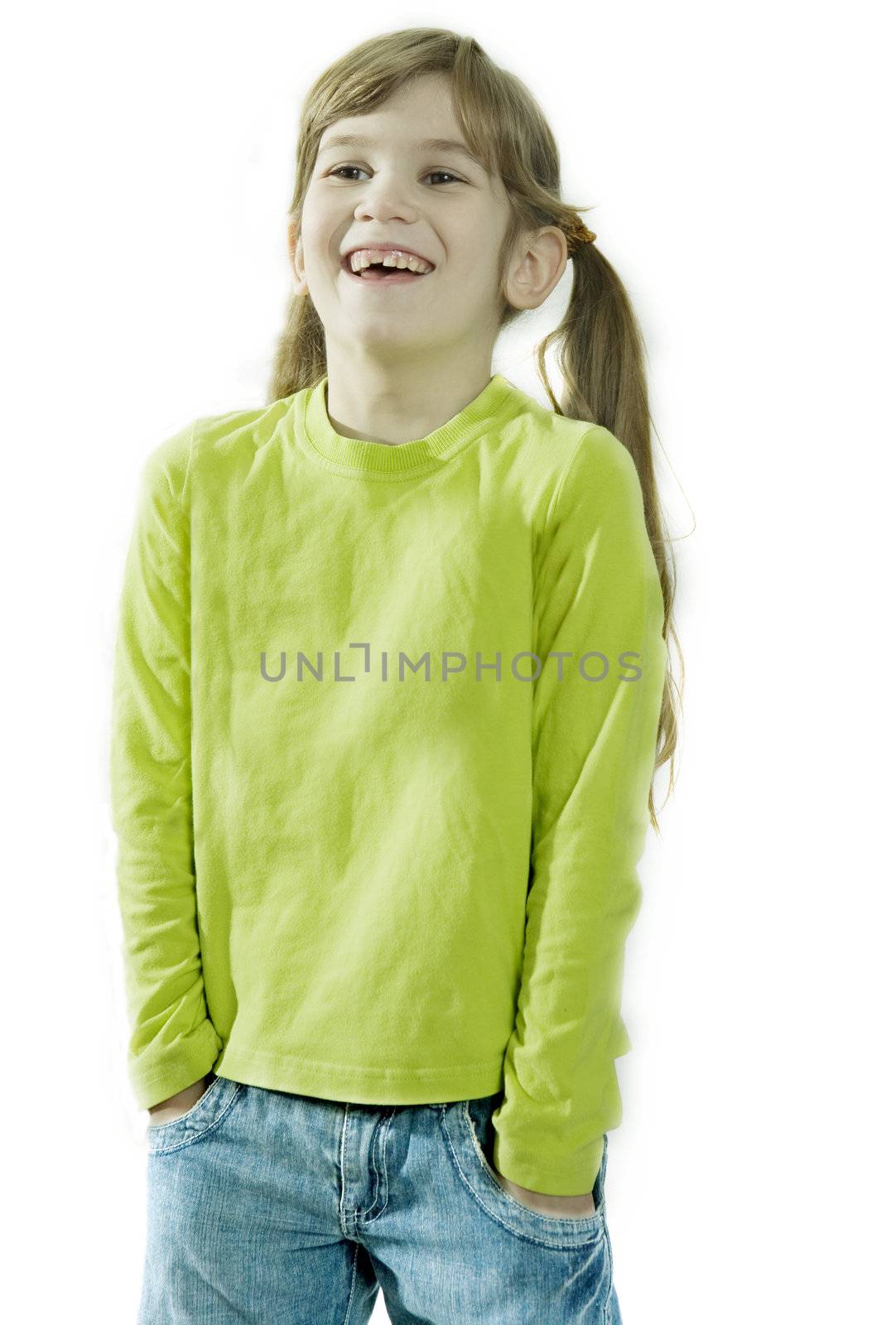portrait of young smiling cute girl. Isolated. Her hands in pocket