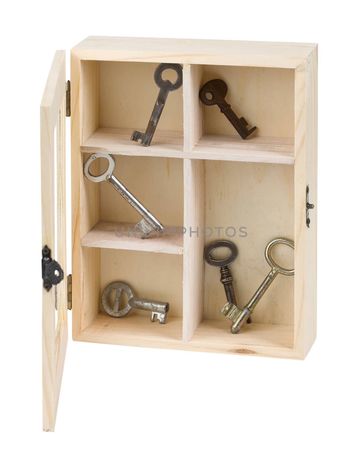 Wooden box with old keys on white background