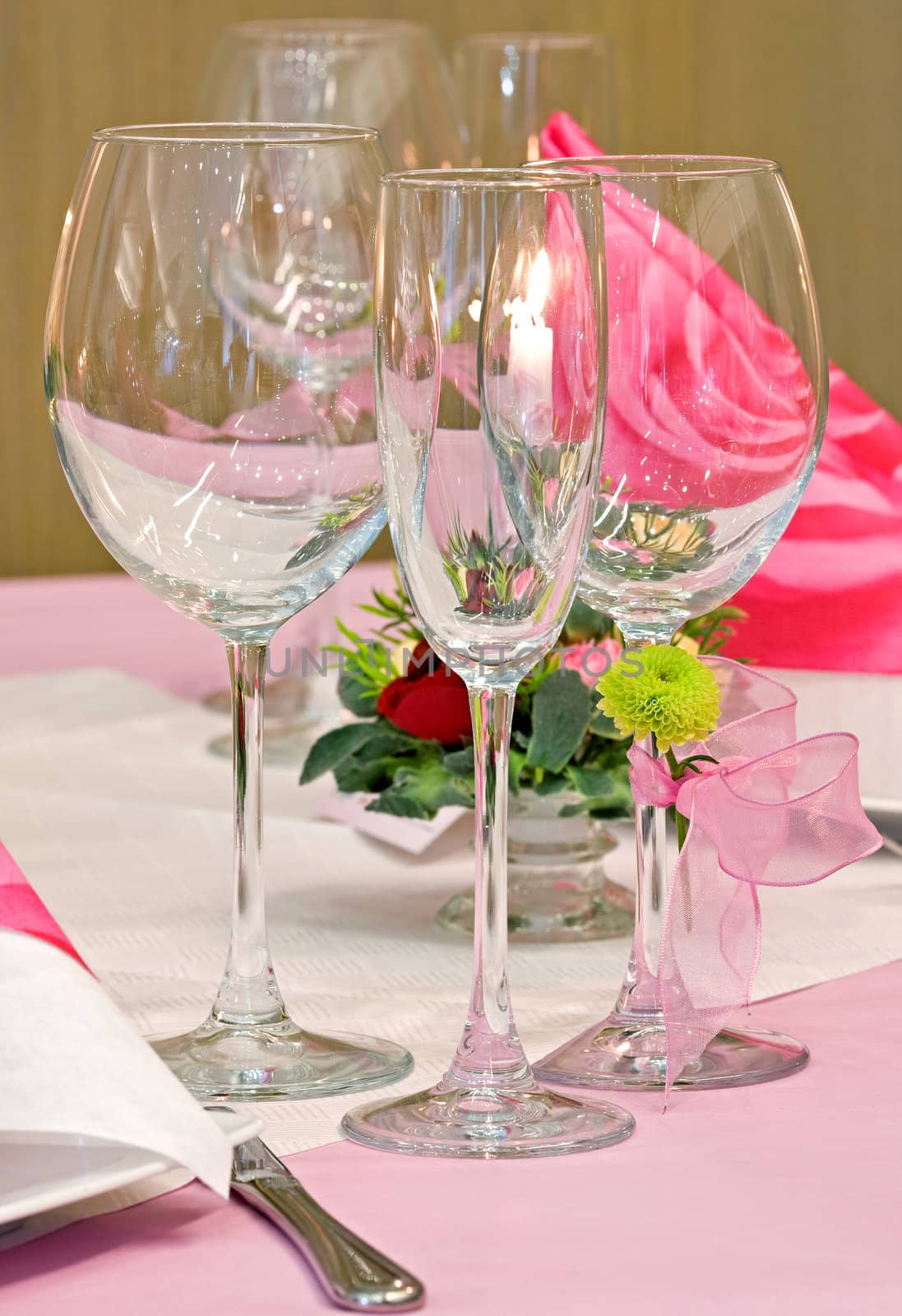 Wedding table decorated with bouquet and candles